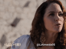 a close up of a woman 's face with the hashtag lialmeida05
