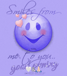 a purple smiley face with the words smiles from me to you