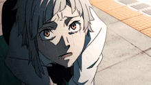 a close up of a person 's face with tears coming out of it