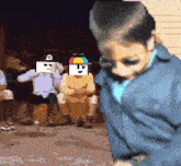 a pixelated image of a boy wearing a blue jacket