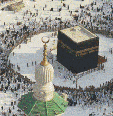 a large crowd of people are gathered around the kaaba mosque
