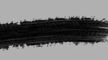 a black brush stroke with the name jeffrey dean morgan