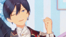 a close up of a person wearing earrings and a bow tie holding a heart in their hand .