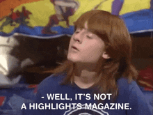 a person with red hair is talking about a magazine .