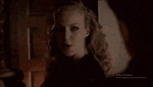 a blurred image of a person with activar windows written on the bottom right