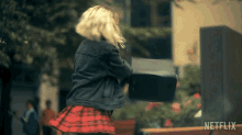 Striking The Briefcase Lila Pitts GIF - Striking The Briefcase Lila Pitts Ritu Arya GIFs