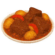 a plate of stew with potatoes and peppers on it