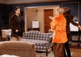 Ross' excited jump on Make a GIF