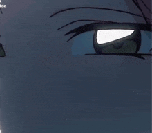 a close up of a cartoon character 's eye with the word toz on the bottom right