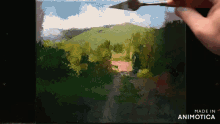 a person is painting a landscape with a spatula and the words made in animotica on the bottom