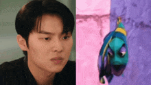 a man and a cartoon fish are next to each other