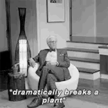 The Good Place Dramatically Breaks A Plant GIF - The Good Place Dramatically Breaks A Plant GIFs