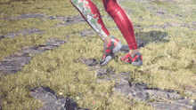 a person wearing a pair of red leggings and red shoes