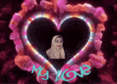 a picture of a woman in a hijab is surrounded by a heart and the words " my love "