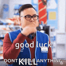a man wearing glasses and a blue vest says good luck and does n't tell anything .