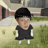 a person wearing a beanie and shorts is standing in the grass in front of a building .