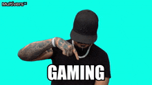 a man wearing a ny hat and a chain says gaming