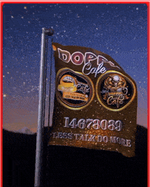 a flag that says doppio cafe is flying in the wind