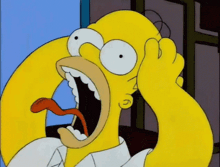 homer simpson with his mouth open and his tongue out