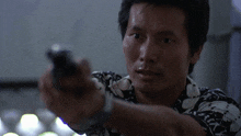 Man On The Brink Alex Cheung GIF - Man On The Brink Alex Cheung Drop Gun GIFs