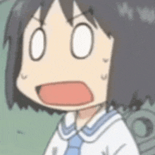 a close up of a cartoon character with a surprised expression on her face .