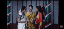 a group of women standing next to each other with the words click here to subscribe on the bottom right