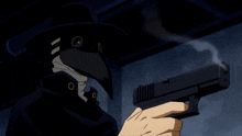 a man in a black hat is holding a gun in his hand