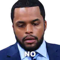 a man in a suit and tie with the word no on his face