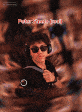 a man wearing headphones and sunglasses has the name peter steele written above him