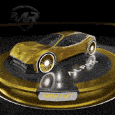 a gold car is on display with the words gold 1 of 1 on it
