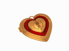 a gold heart shaped locket with a red heart that says fuck me emoboy