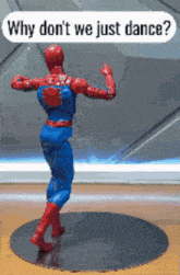 a spiderman action figure is dancing with the words why don 't we just dance