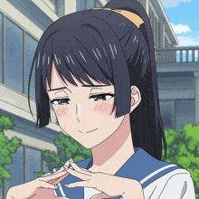 a girl with a ponytail is making a funny face with her hands