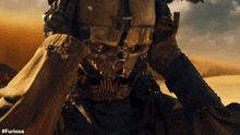 Putting Skeleton Face On Furiosa GIF - Putting Skeleton Face On Furiosa Furiosa A Mad Max Saga GIFs