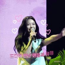 a girl singing into a microphone with hearts surrounding her and jingmyeoon written below her