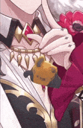a close up of a person wearing a necklace and a red flower