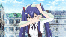 a girl with blue hair is covering her face with her hands