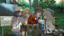 a group of anime girls are standing around a large red object with chinese writing on it