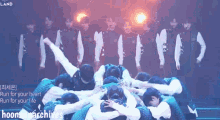 a group of people are standing in a circle with their arms around each other and the words run for your heart run for your life