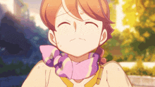 a girl with red hair and a pink scarf around her neck is sweating