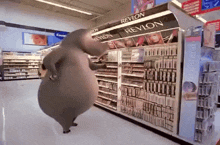 a revlon display in a store with a stuffed animal dancing in front of it