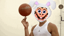 a man wearing a bunny costume is holding a basketball on his finger .