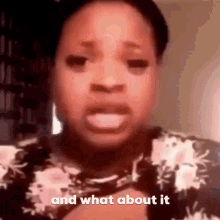 a woman is making a funny face and says `` and what about it ''