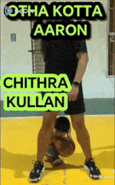 a man is dribbling a basketball on a basketball court with the name chithra kullan on the bottom right