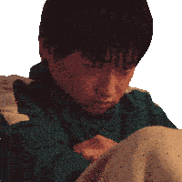 a close up of a person 's face with a white stripe on the sleeve