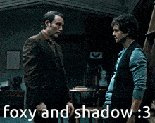 two men are standing next to each other with the caption foxy and shadow 3