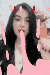 a girl with devil horns on her head is surrounded by pink swirls