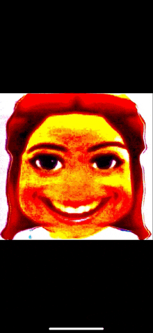 a close up of a woman 's face with a big smile on her face