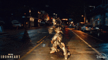 a poster for ironheart shows a man in a space suit walking down a street