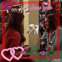 a picture of two women sitting at a table with the words i love you